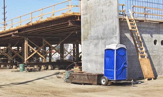 portable toilets set up for construction workers